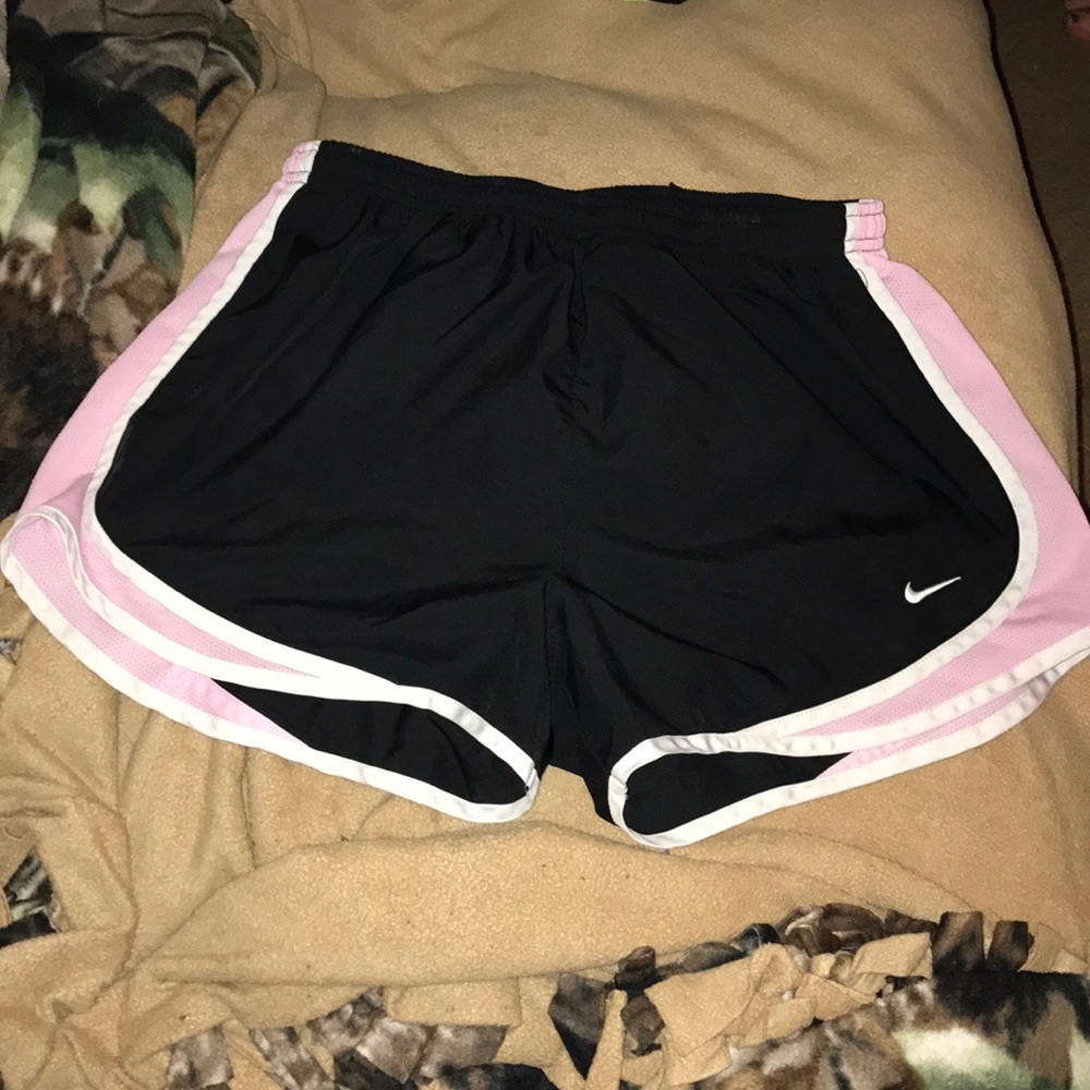 Pink and black Nike shorts